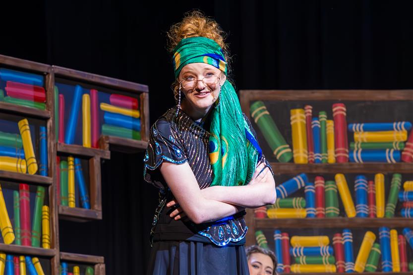 Students perform onstage